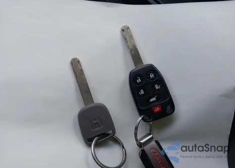 2011 Honda Odyssey Ex-L z USA, uszkodzony, nr VIN 5FNRL5H64BB099611